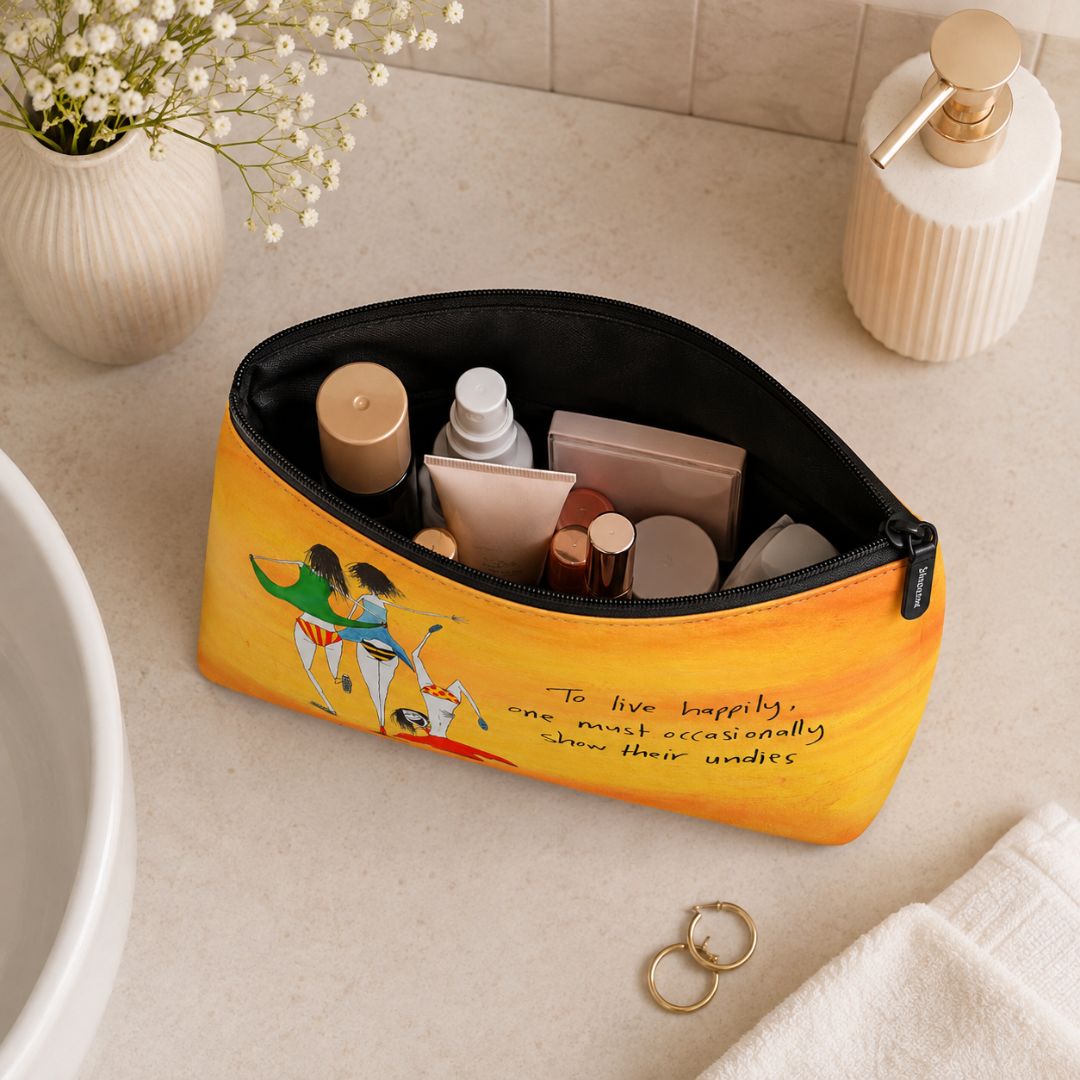 'To live happily, one must occasionally show their undies' Cosmetic Bags (2 sizes)