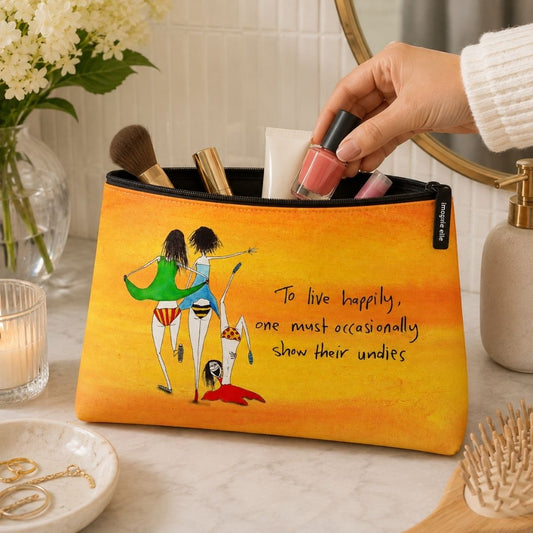 'To live happily, one must occasionally show their undies' Cosmetic Bags (2 sizes)