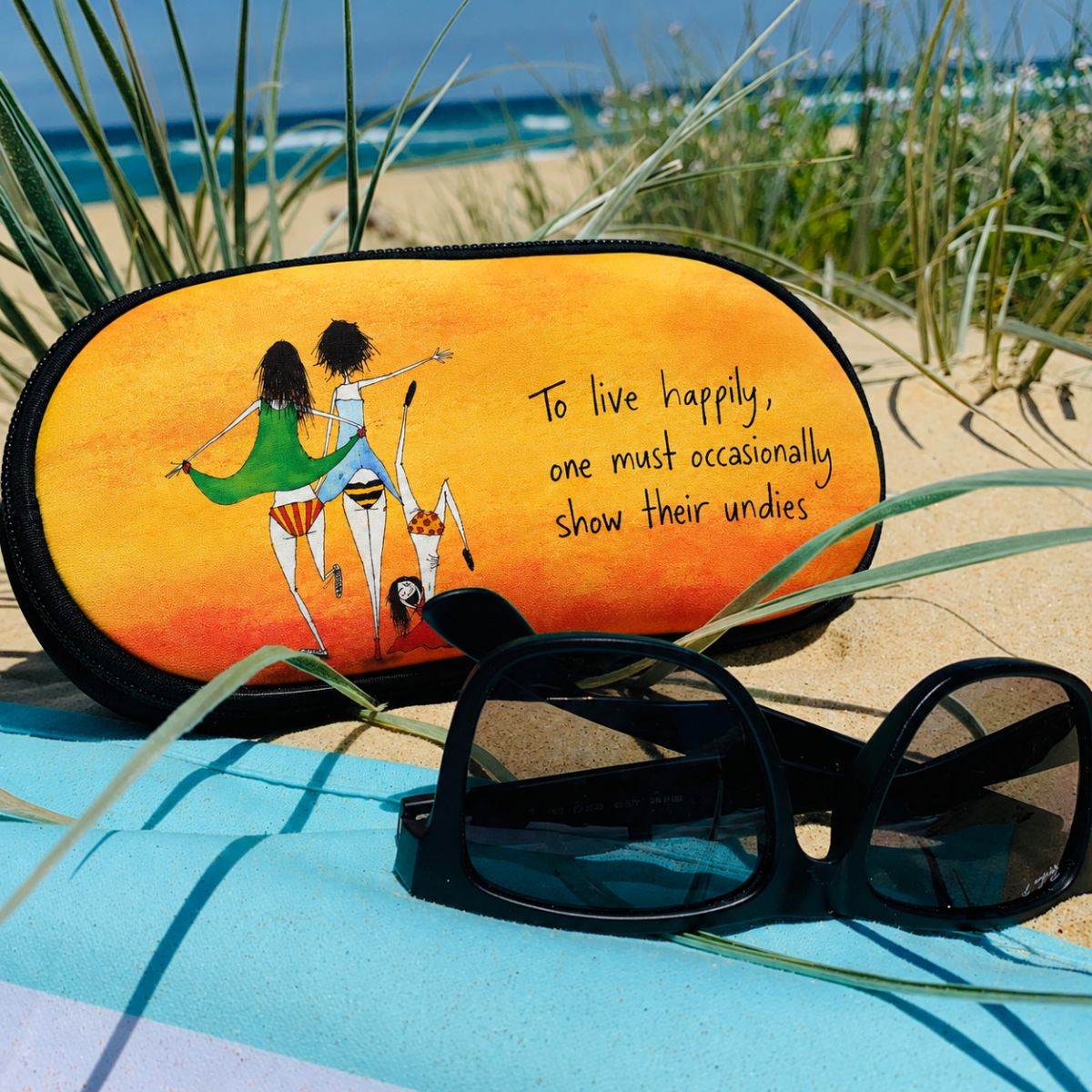 'To live happily one must occasionally show their undies' - Sunglasses Case